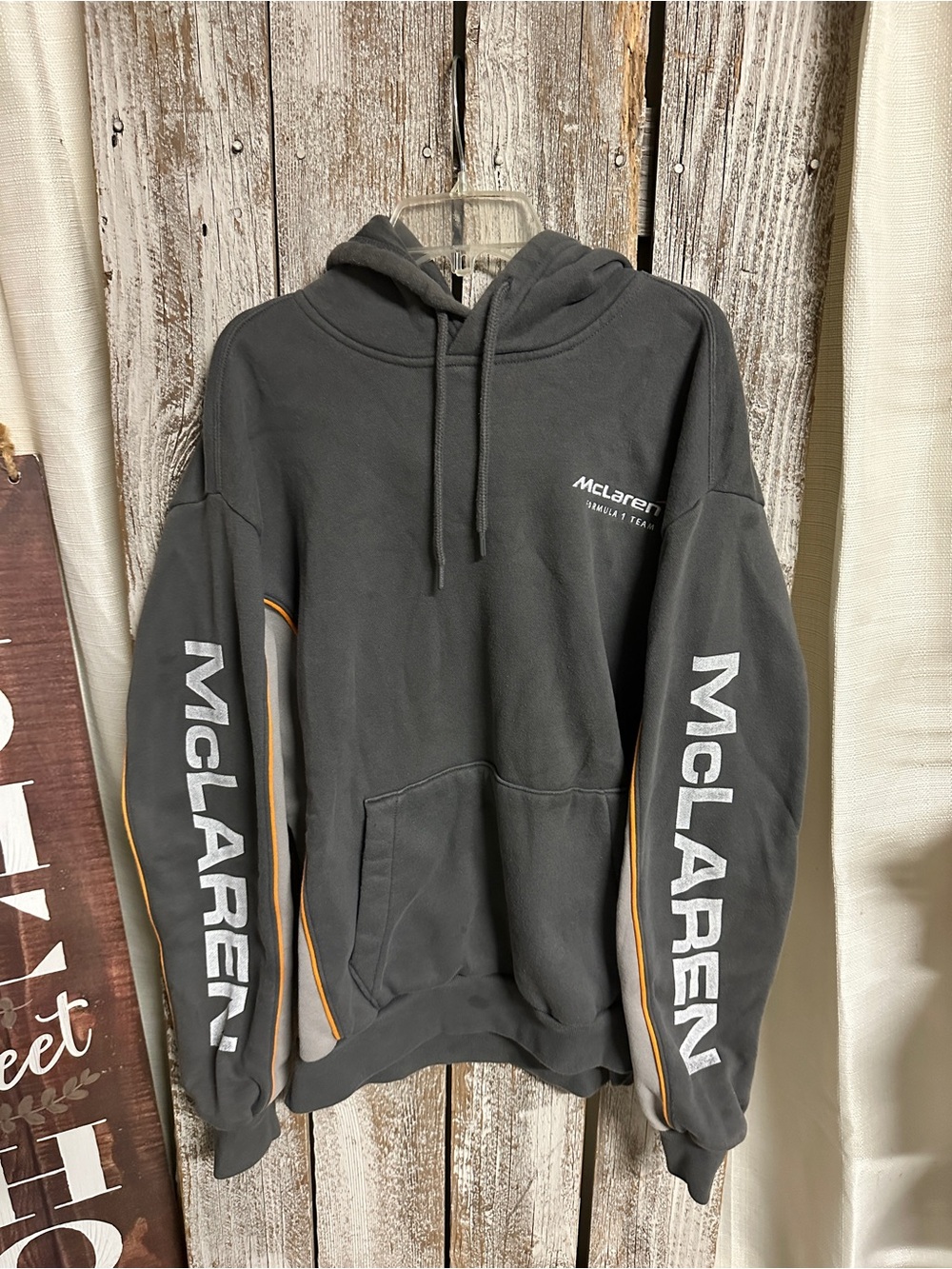 Hollister Dark Gray Pullover Hoodie with White Sleeve Logos and Orange Piping